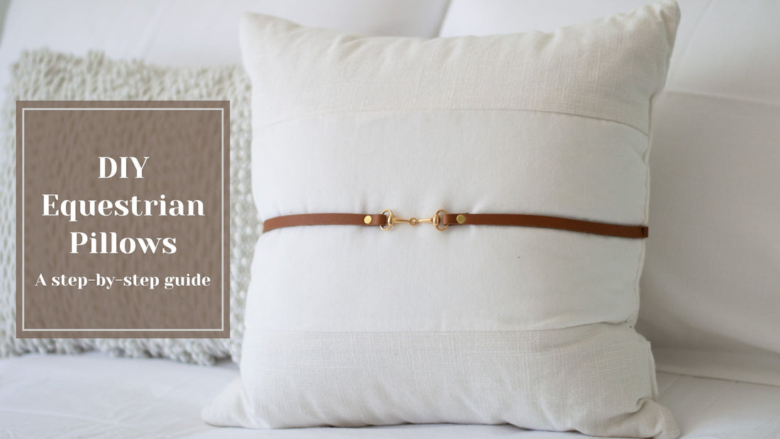 A cream pillow with leather strip & gold bit.
