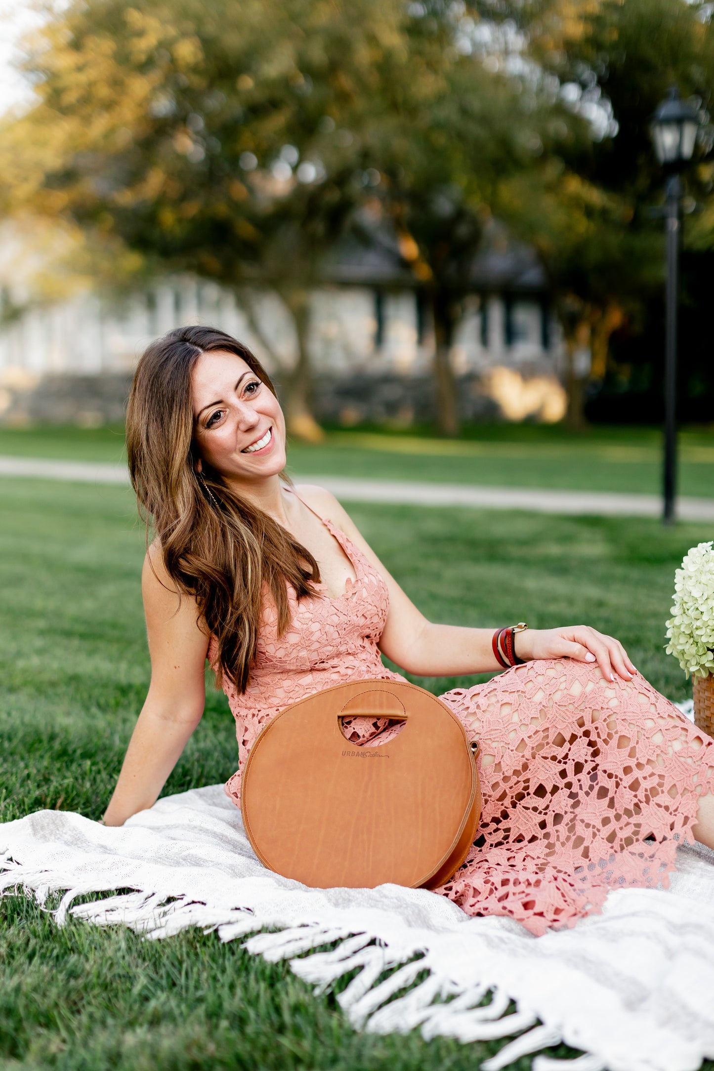 The Urban Southern handcrafted leather Britt Circle Crossbody in Honey.
