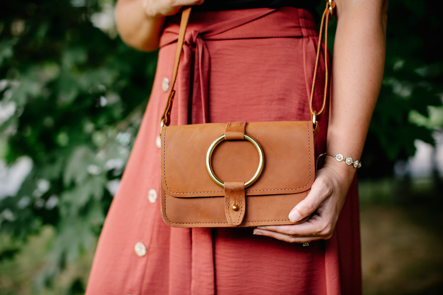 The Urban Southern handcrafted leather 5-pocket Crossbody Bag in Honey.