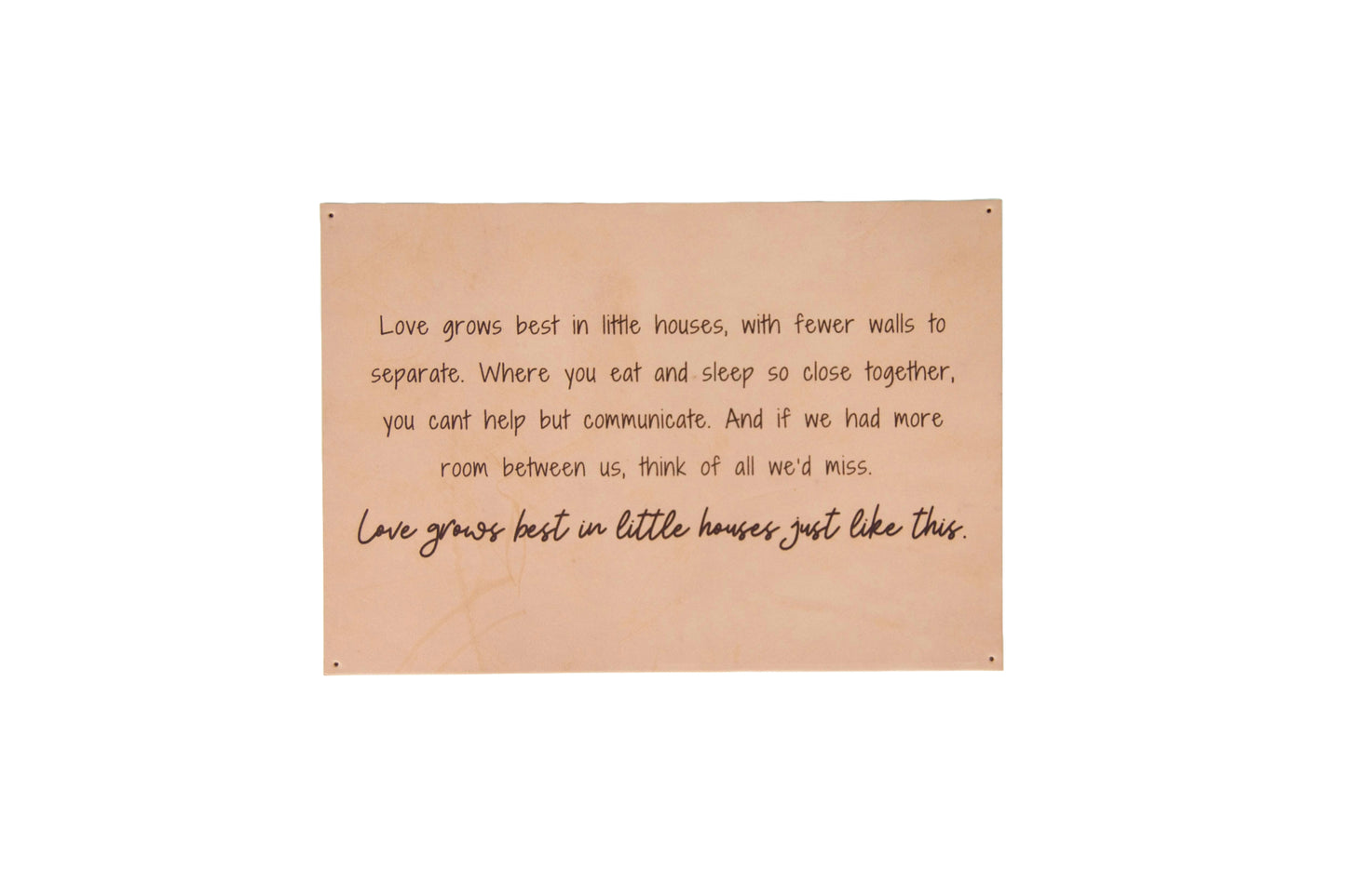 The Urban Southern handcrafted leather "Love Grows Best" sign.