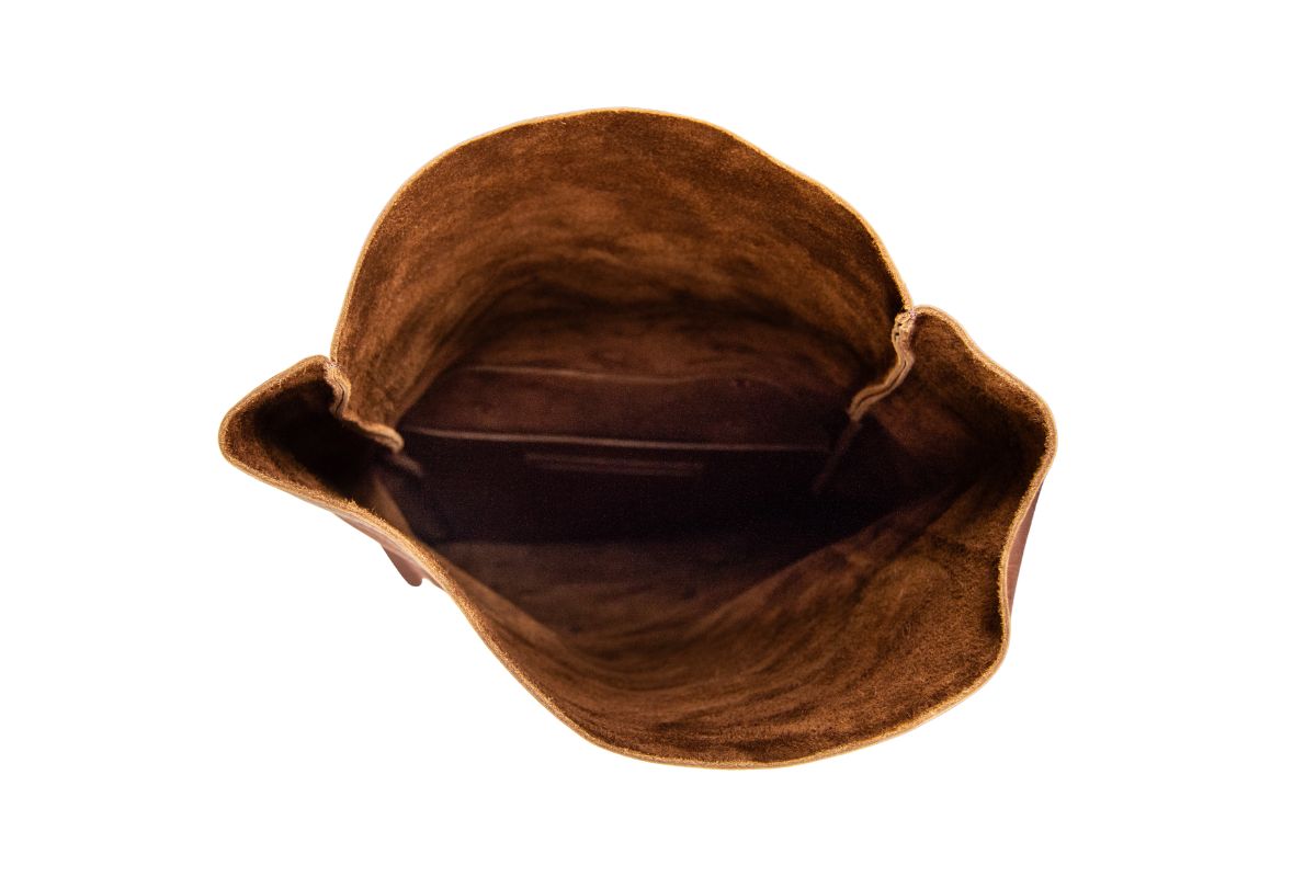 The roomy interior of the rolltop leather backpack.