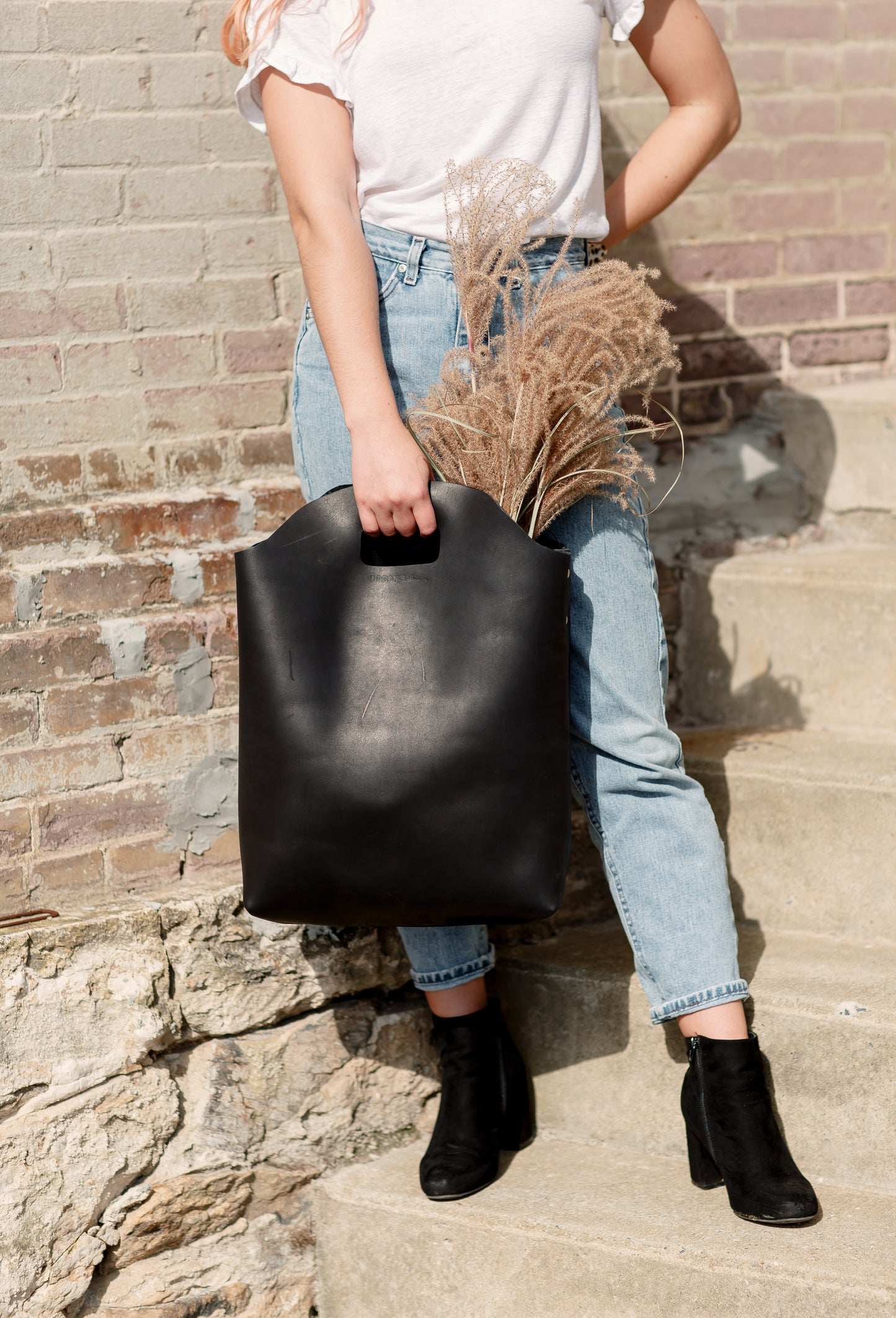 The Market Tote can be carried either with the straps or by the handles.