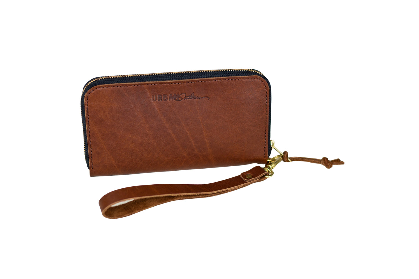 Close up details of the front of the Urban Zipper Wallet, including its detachable wristlet strap.