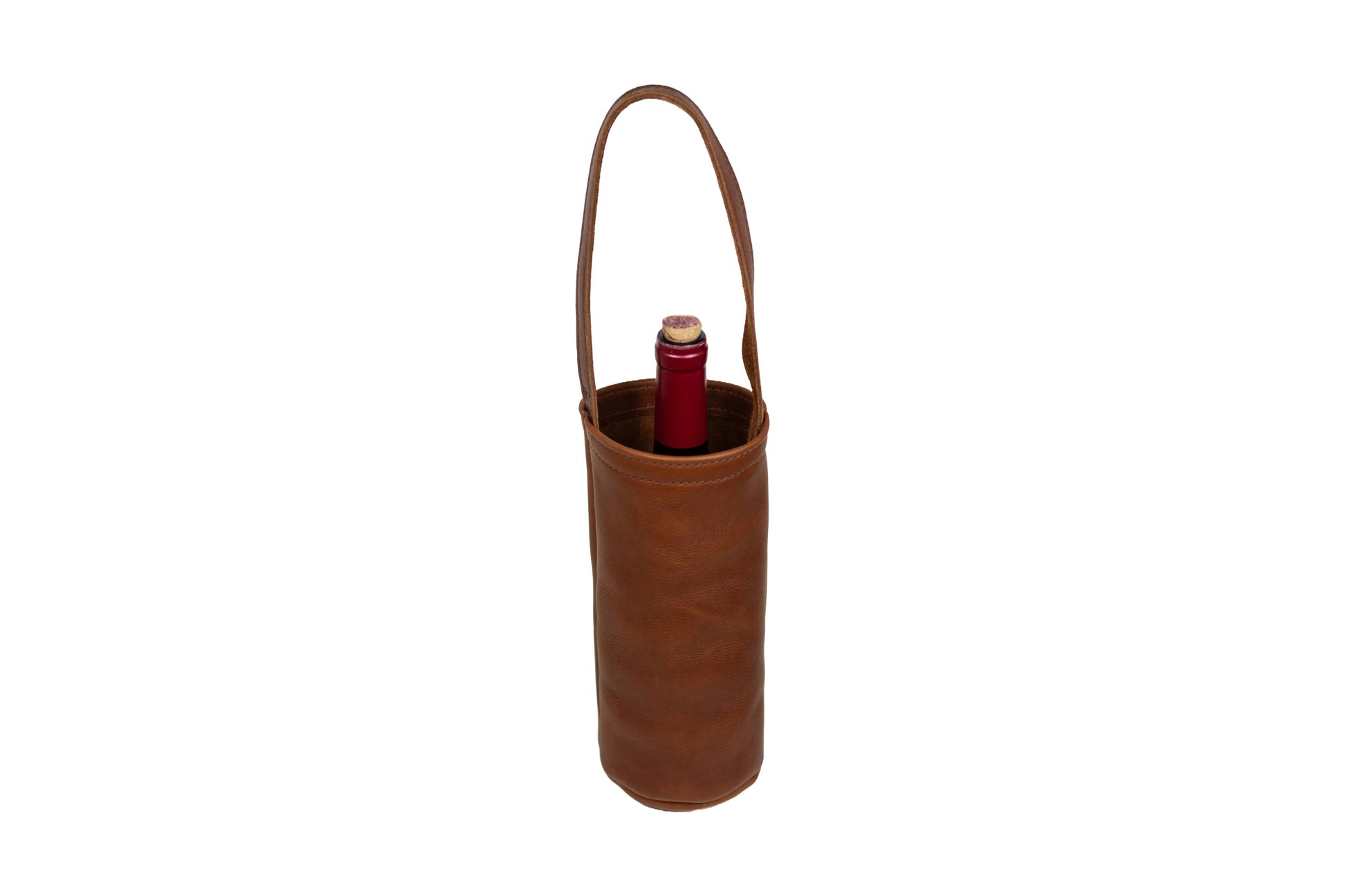 The Urban Wine Tote, handcrafted from full-grain leather, with a carry handle & an interior compartment large enough to hold a standard-sized wine bottle.