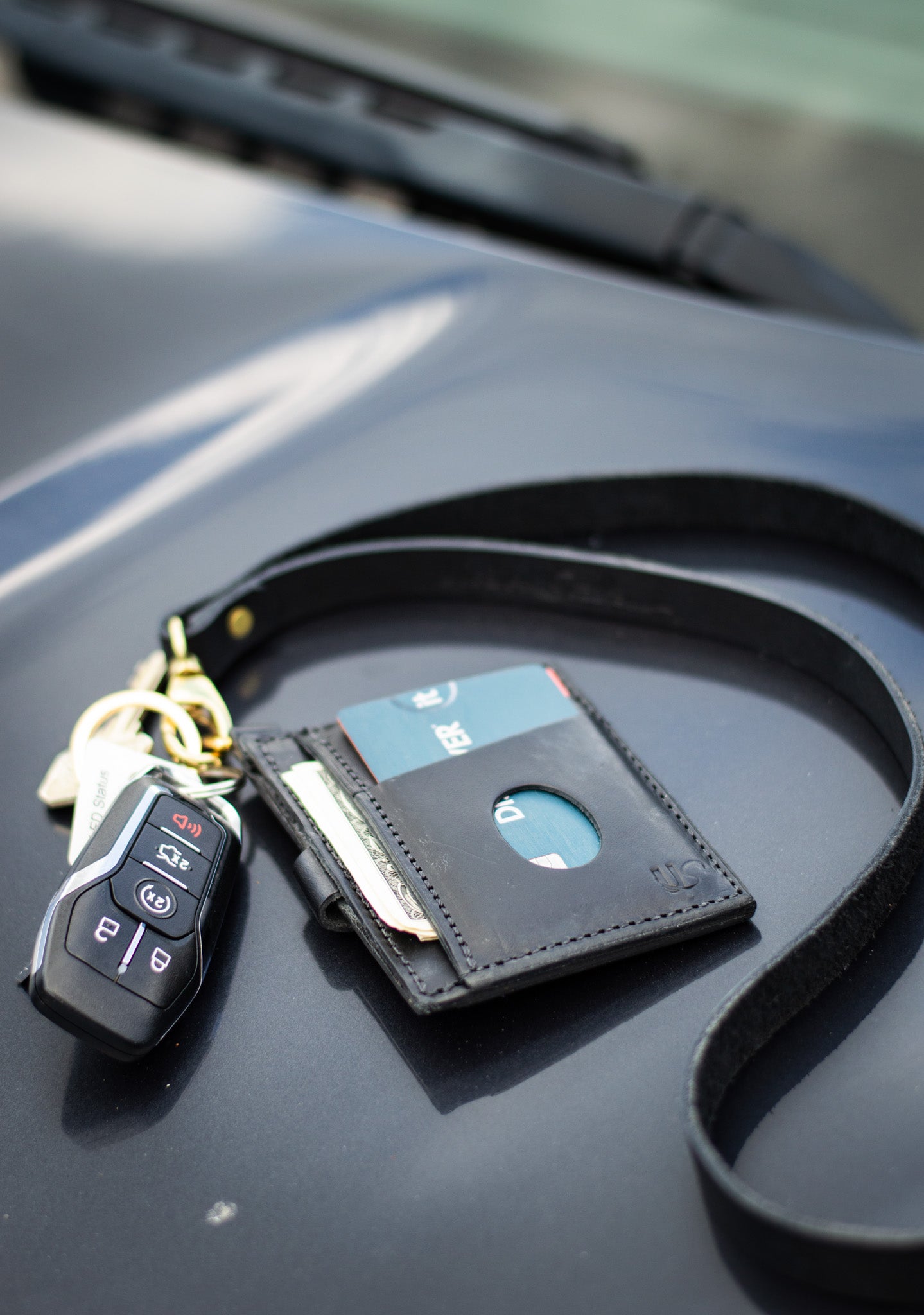 Easily carry your wallet and keys by clipping the Urban Southern Everly Wristlet Wallet to the Leather Lanyard.