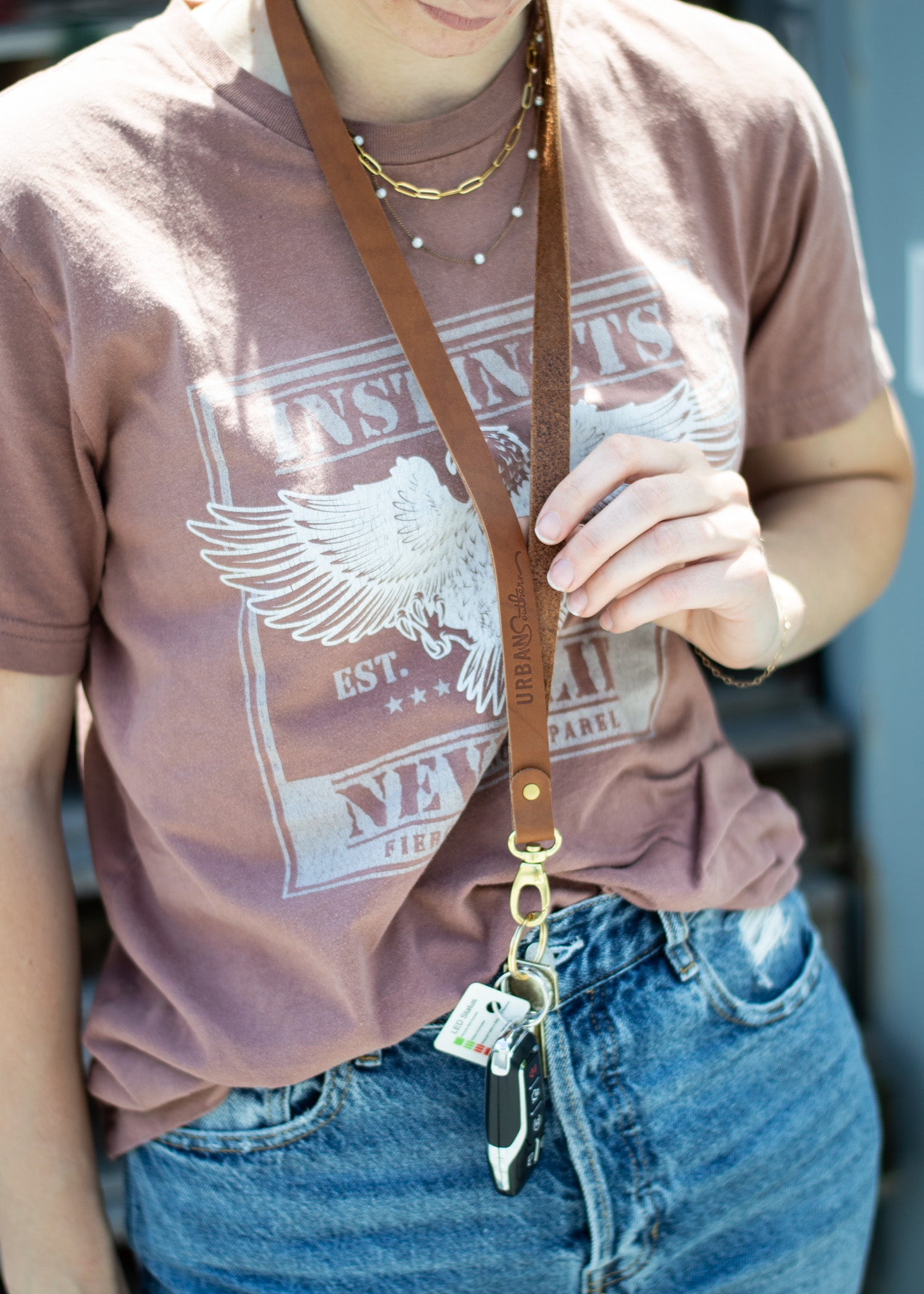 The Urban Southern logo is engraved on the Leather Lanyard.