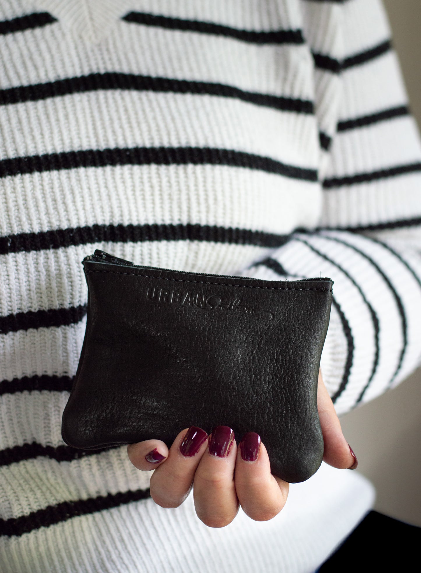 The Mini Zipper Pouch in Black.