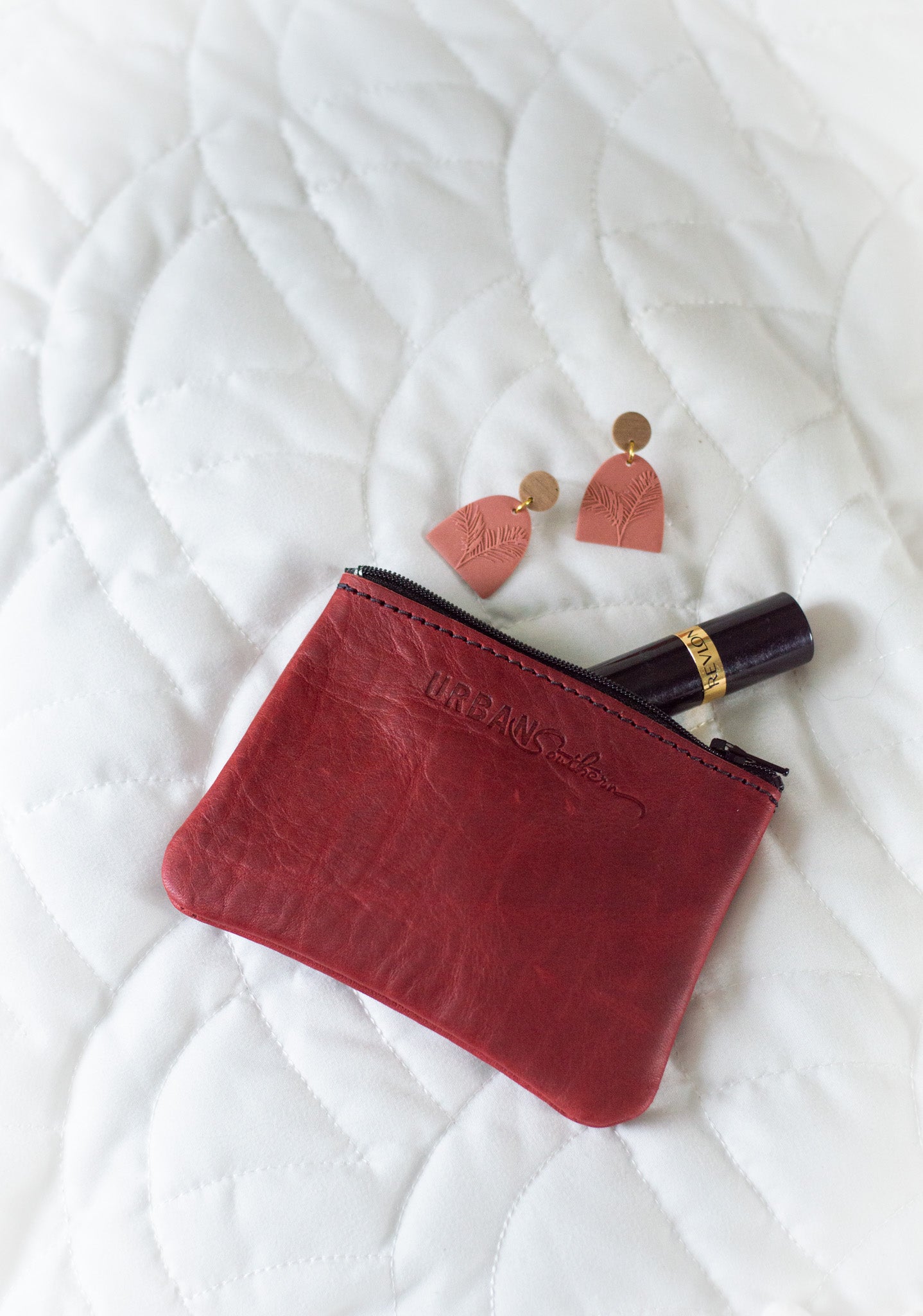The Mini Zipper Pouch in Merlot.