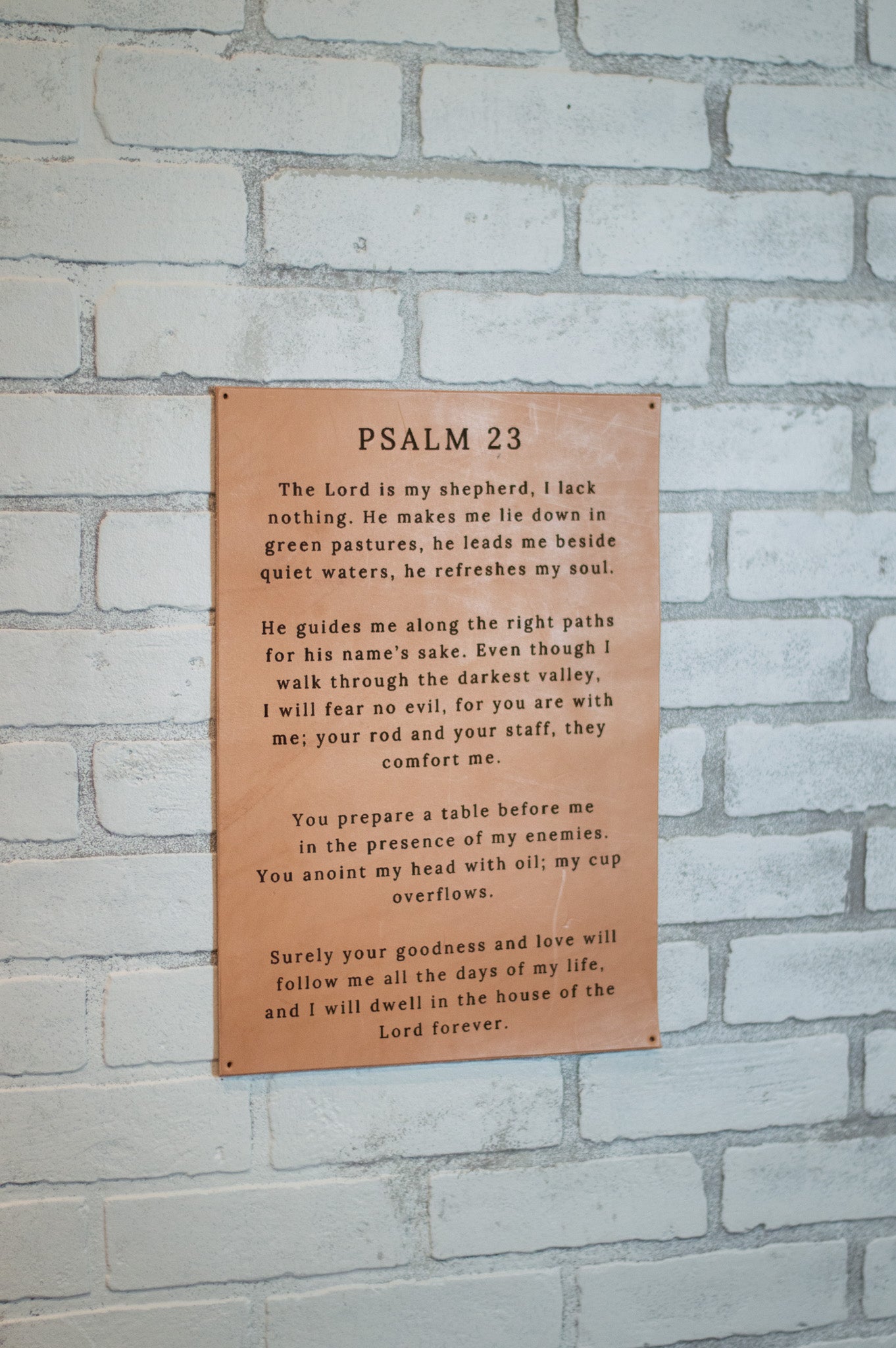 Psalm 23 Leather sign mounted on brick wall