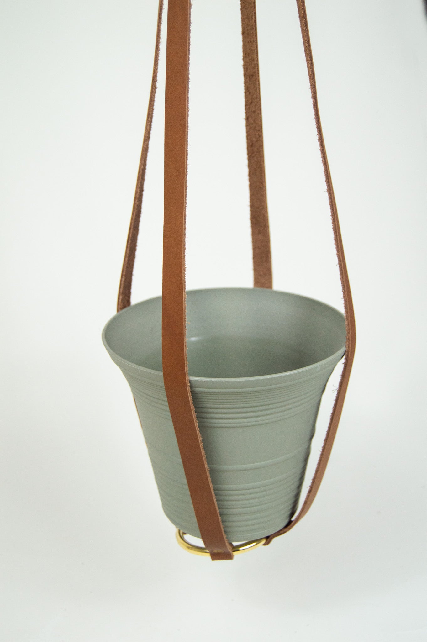 The Urban Southern handcrafted leather Plant Hanger accommodates a variety of plant pot sizes from small to medium.