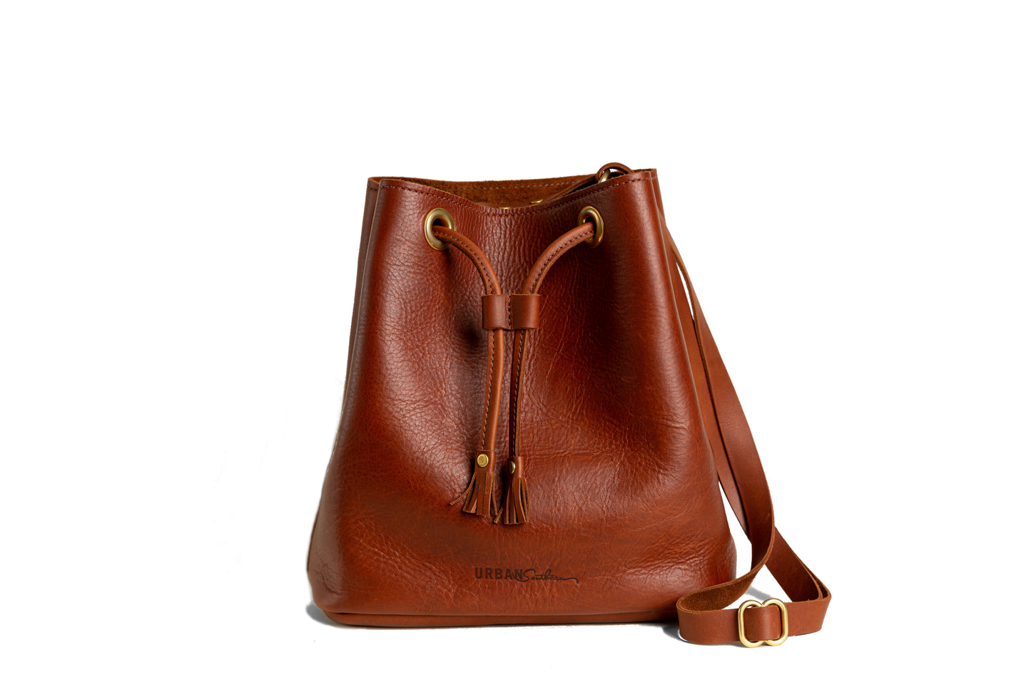 The Urban Bucket Bag, handcrafted using full-grain leather & brass hardware.
