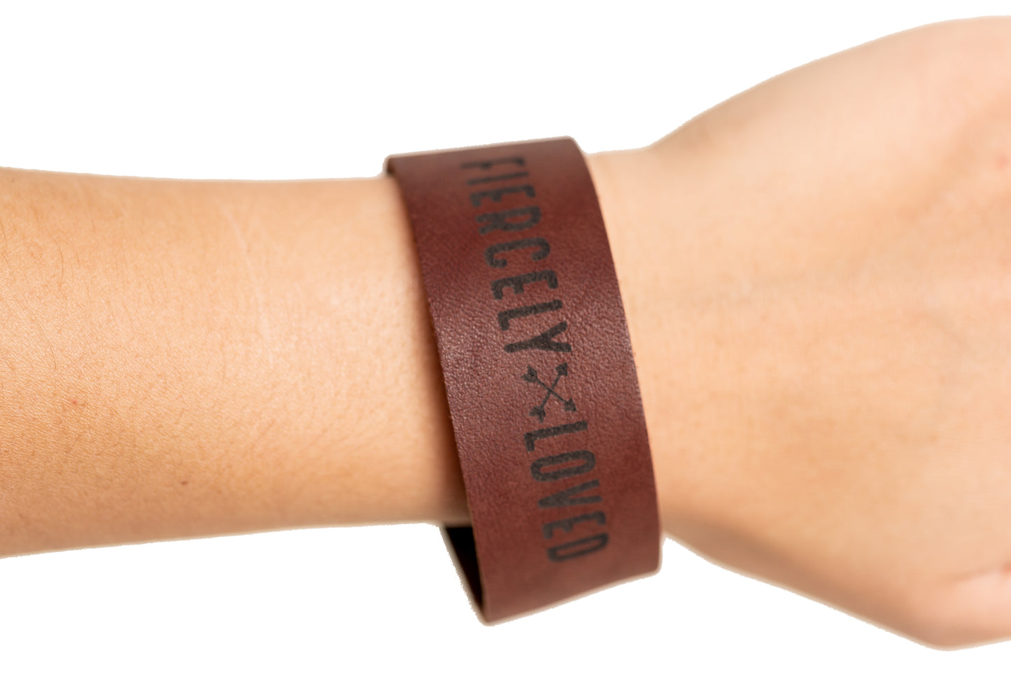 The Fiercely Loved leather cuff bracelet is best sized about 1 inch larger than the wrist for a comfortable loose fit that won't fall off.