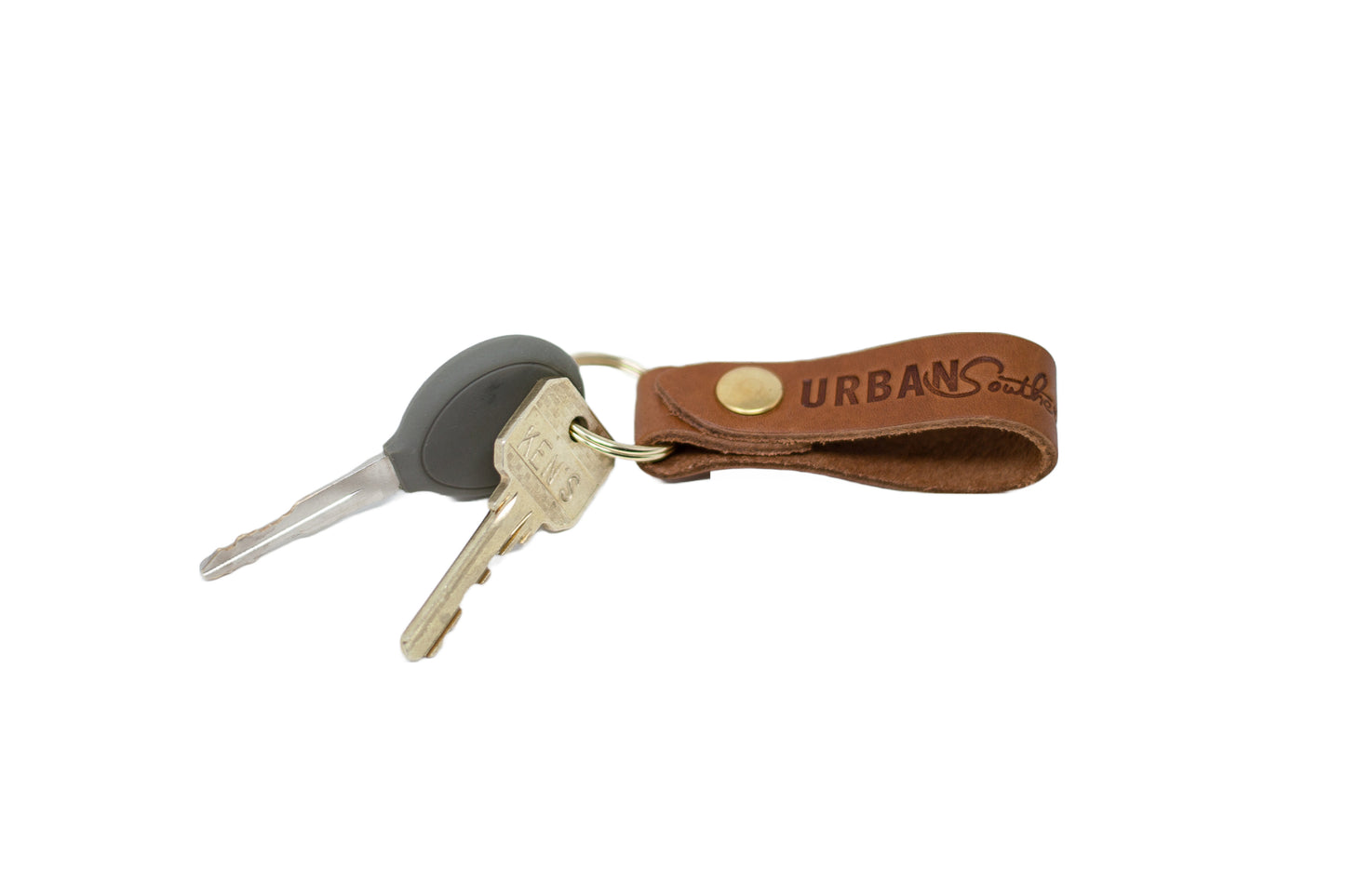 Attach your essential keys to the brass ring with ease.