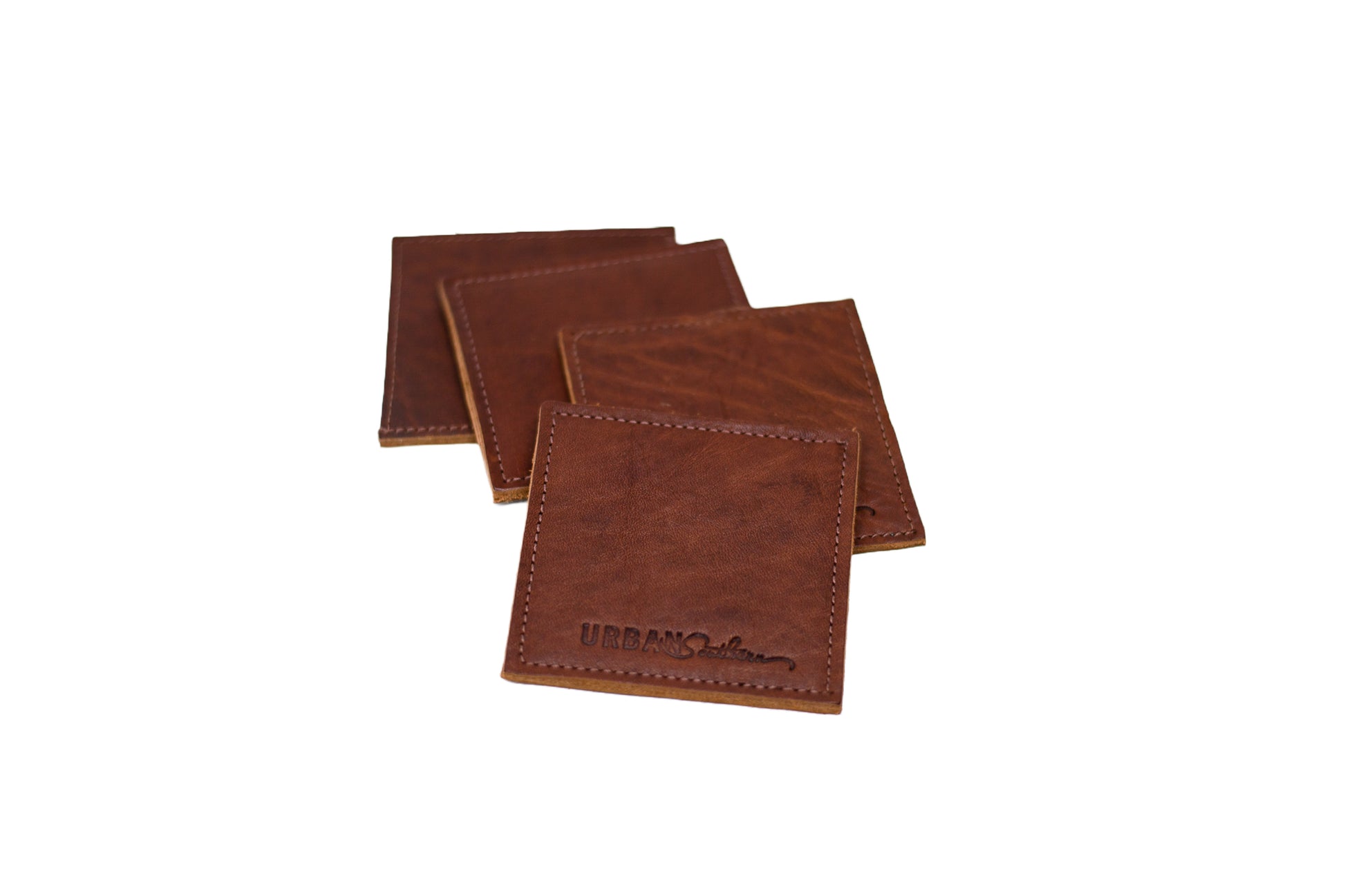 The Urban Southern handcrafted leather Coaster is available as a single count or in a set of four coasters.