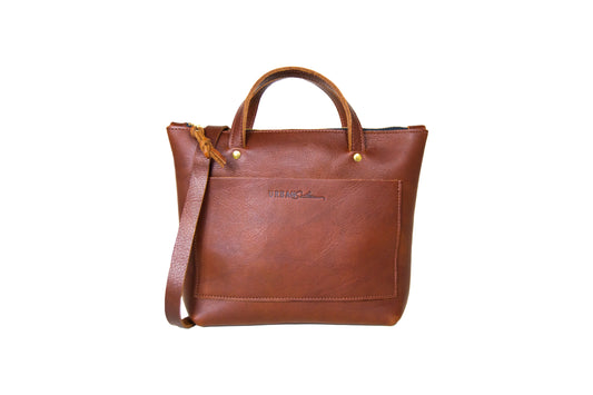 The Quinn Crossbody, handcrafted from full-grain leather & brass hardware.