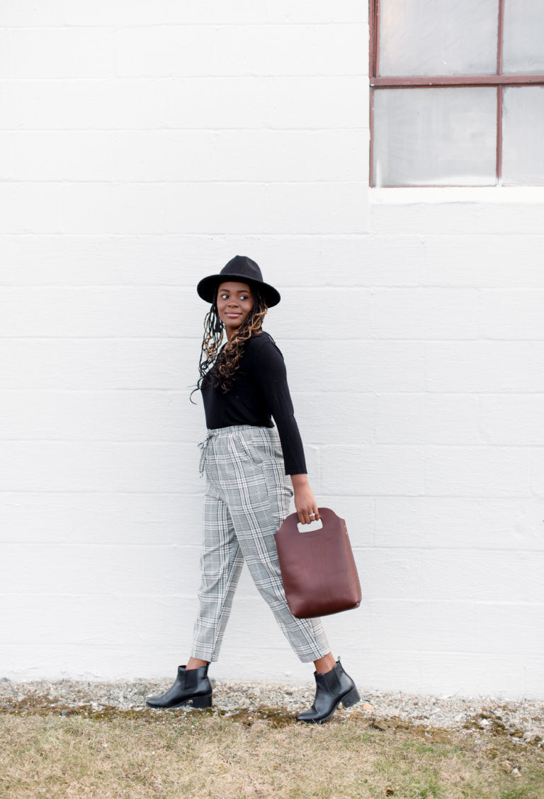 The Urban Southern Mini Market Tote can be carried by the handles instead of the straps.