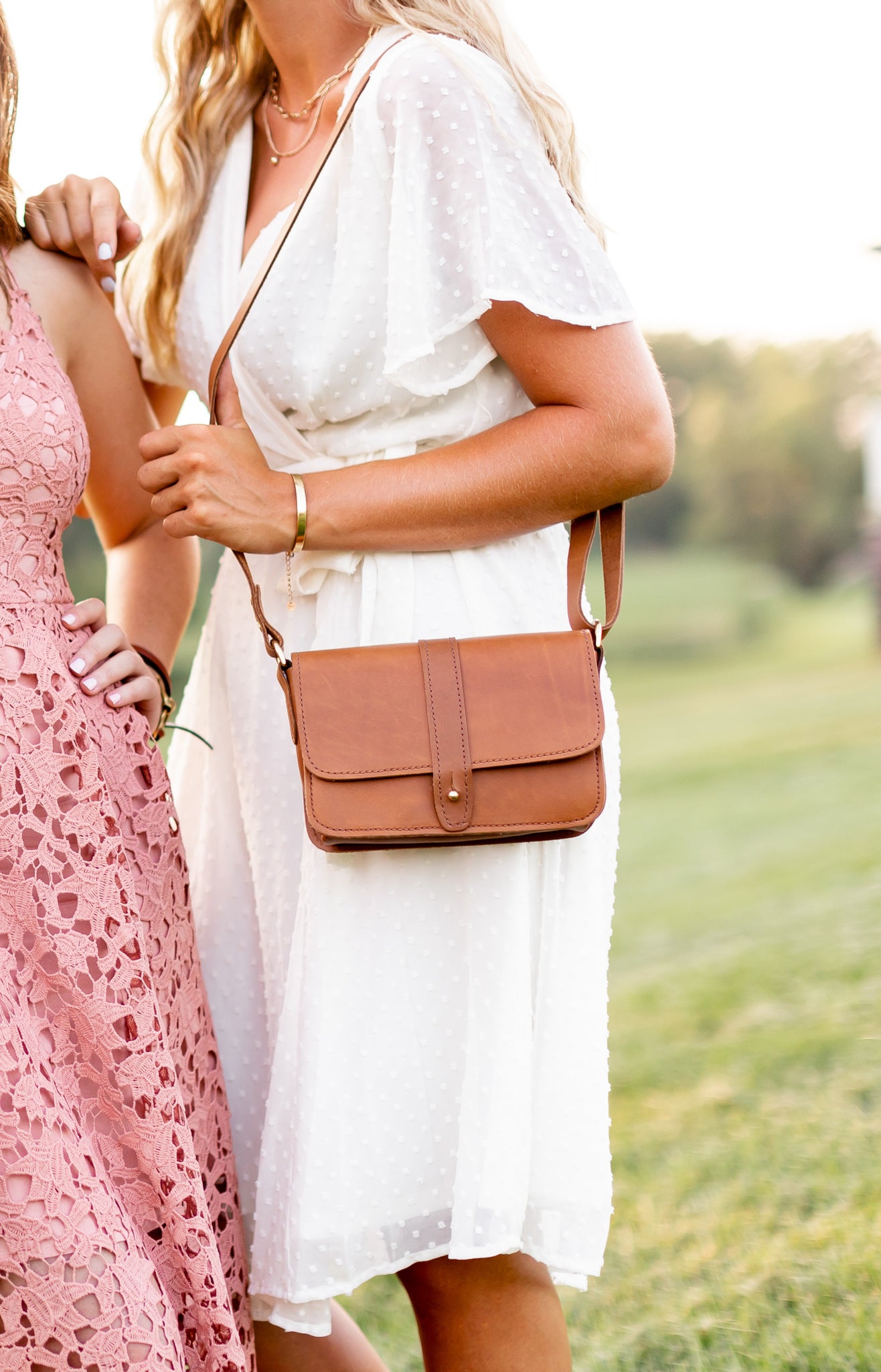 The Urban Southern handcrafted leather Lancaster 5-Pocket Crossbody bag in Honey.