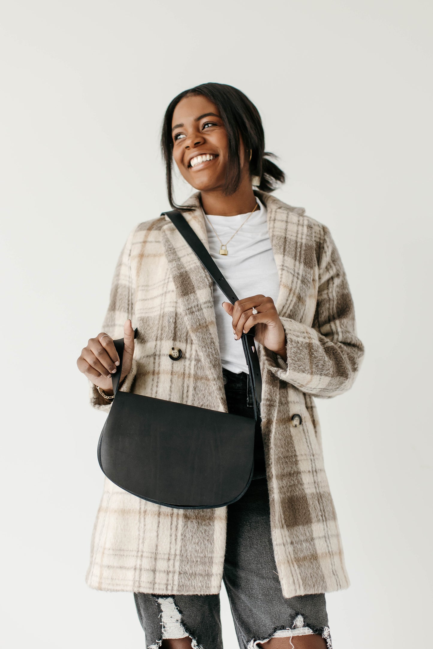 The Urban Southern handcrafted leather Half Moon Crossbody bag in Black.