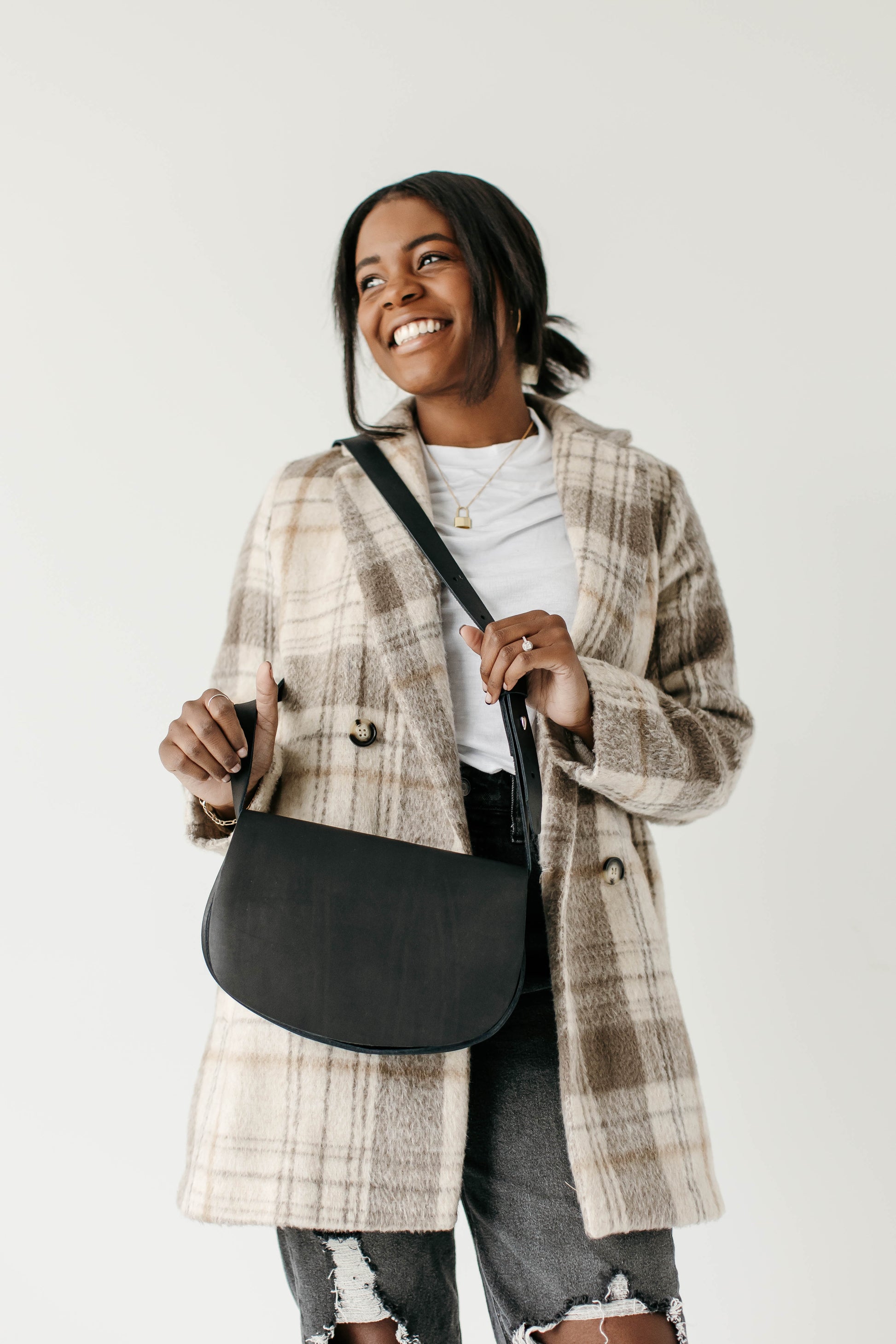 The Urban Southern handcrafted leather Half Moon Crossbody bag in Black.