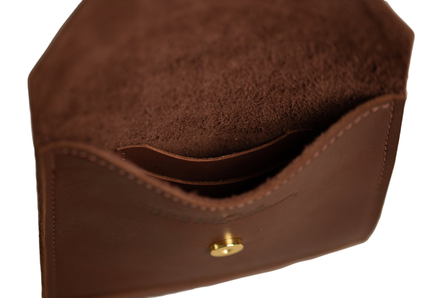 A look at the interior of the Postal Crossbody with its two interior slot pockets.
