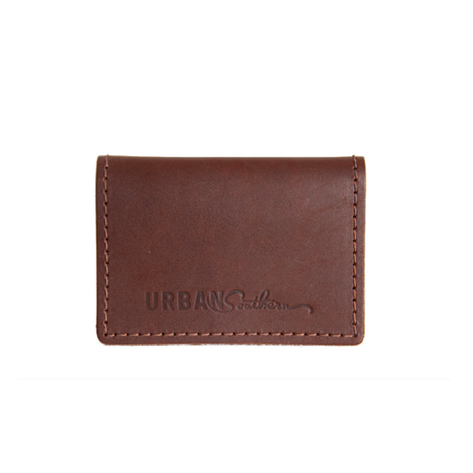 The handcrafted Leather Bifold Card Wallet in Chestnut Brown, with handmade stitching and engraved Urban Southern logo