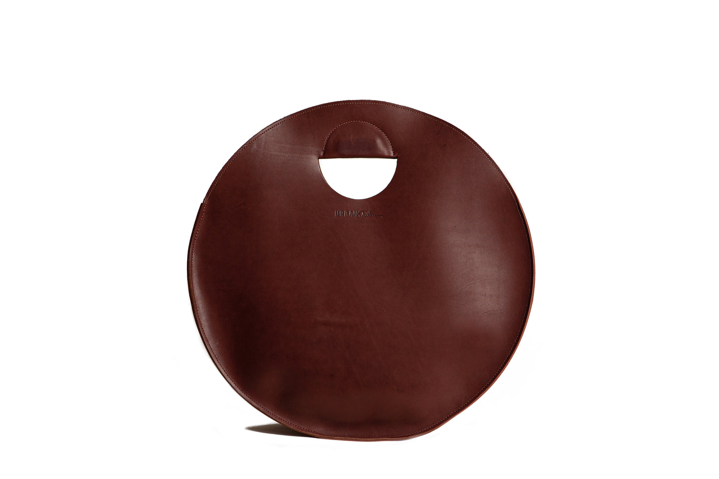 Handmade Leather Carrollton Circle Tote in Chestnut Brown with engraved Urban Southern logo.