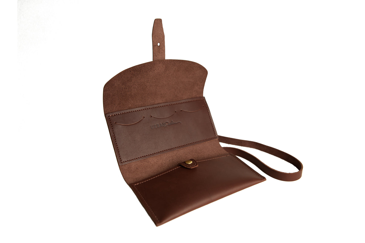 The inside of the handcrafted leather Crossbody Wallet includes the engraved Urban Southern logo, three card slots, an upper cash pocket, and a lower larger pocket sized to fit a cell phone.
