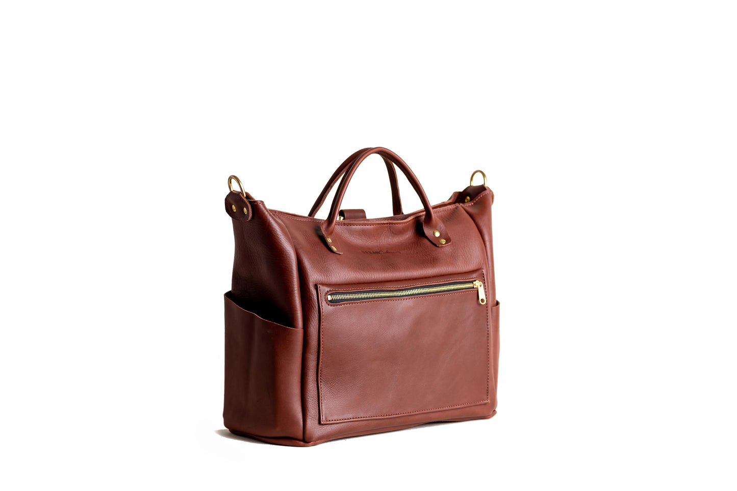 The Urban Southern handcrafted leather Legacy Backpack Tote shown with the adjustable straps removed, in Chestnut Brown.