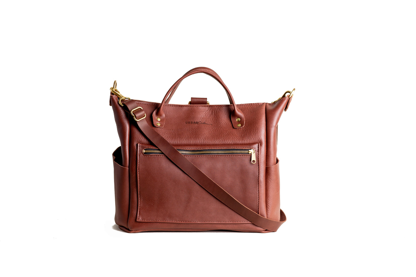 The Urban Southern handcrafted leather Legacy Backpack Tote has two side open pockets, one front zipper pocket, two carrying handles, the Urban Southern engraved logo, and adjustable removable straps.