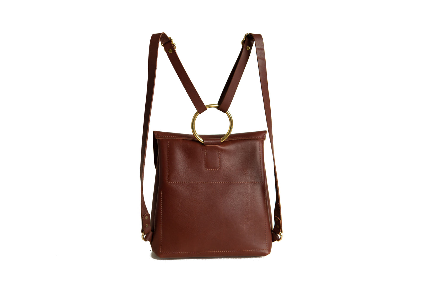 The Urban Southern Monterey Backpack features a large brass ring on the back, connecting the adjustable straps to the top of the bag.