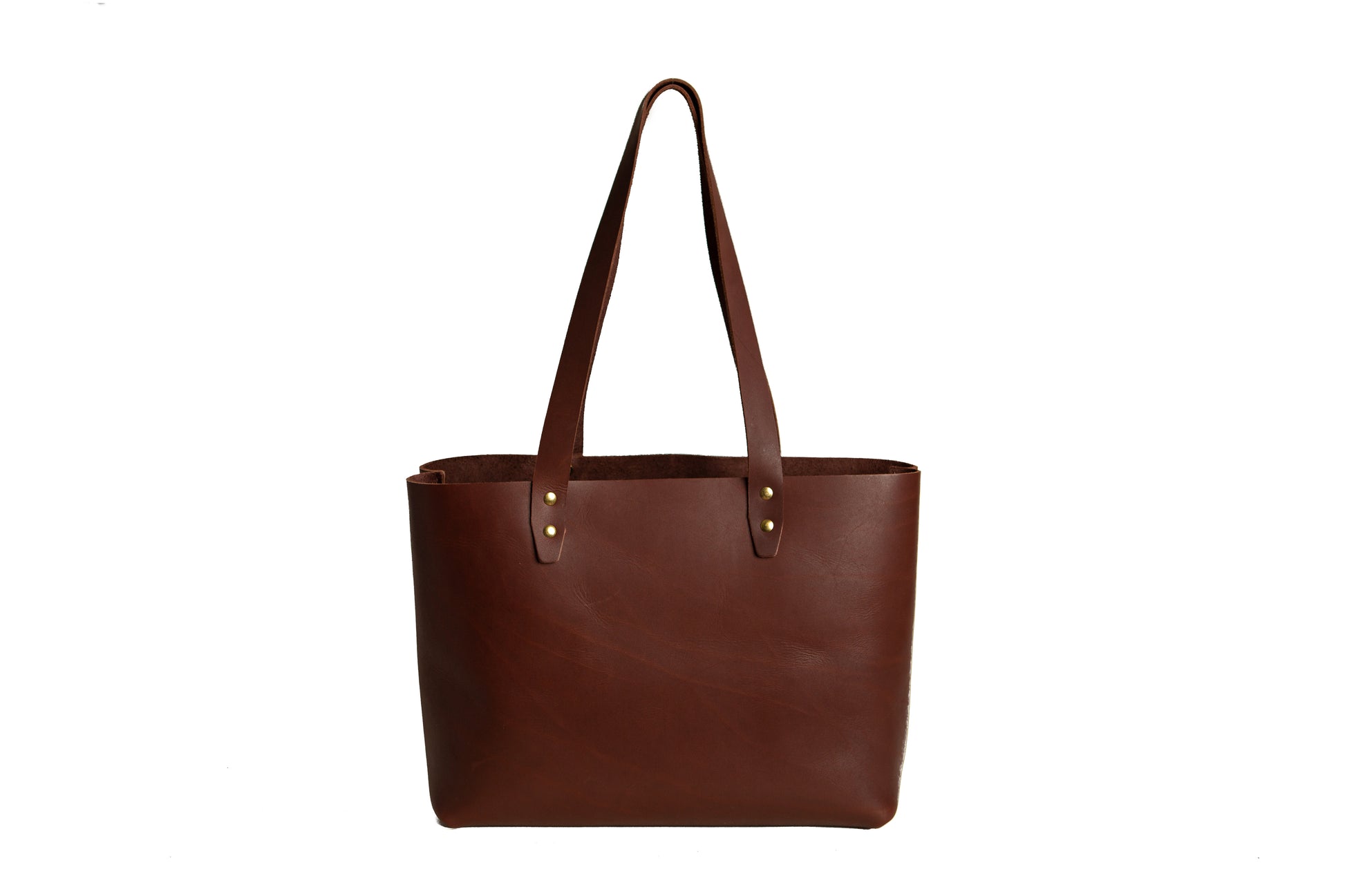 The Urban Tote features two leather carrying straps.