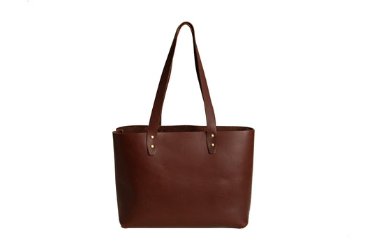 The Urban Tote features two leather carrying straps.