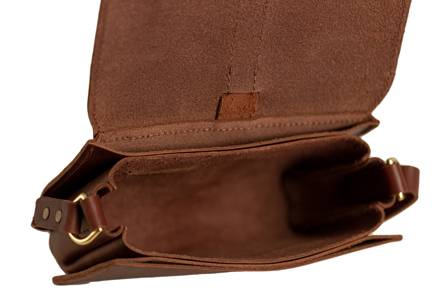 The outer flap is lifted up, revealing a large interior storage area on the Lancaster 5-Pocket Crossbody bag.