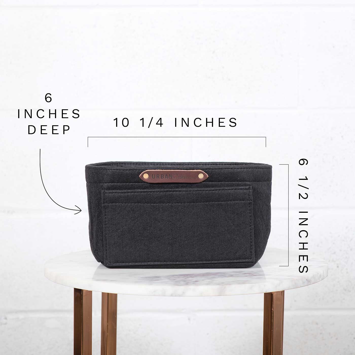The size of the Urban Southern tote insert is 6 inches deep, 10 and a quarter inches wide, and six and a half inches tall.