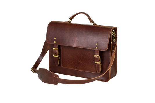 The Executive Briefcase, featuring full-grain leather, optimal interior organization & vintage looking quick-release clasps. 