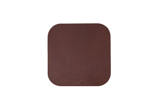 The handcrafted full-grain leather Mouse Pad, featuring a sturdy non-slip backing & classy yet minimal US logo. 
