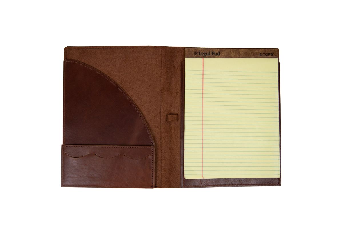 Brown leather padfolio lays open on a white background, featuring 3 card slots, a pen loop, & notepad.