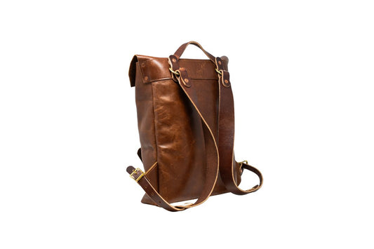 The back of a urban rucksack, showcasing its adjustable leather backpack straps.