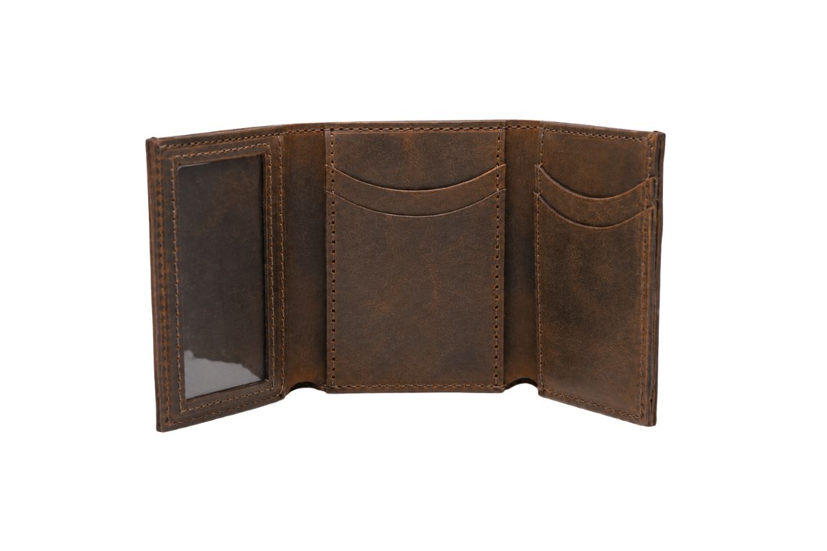 A brown leather trifold wallet lies open showcasing its 6 credit card slots & photo id window.