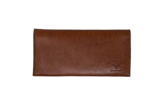 Front exterior of a cognac leather western wallet, with urban southern longhorn steer logo on the bottom right corner. 