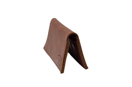 Side view of a leather western wallet with urban southern  brand. 