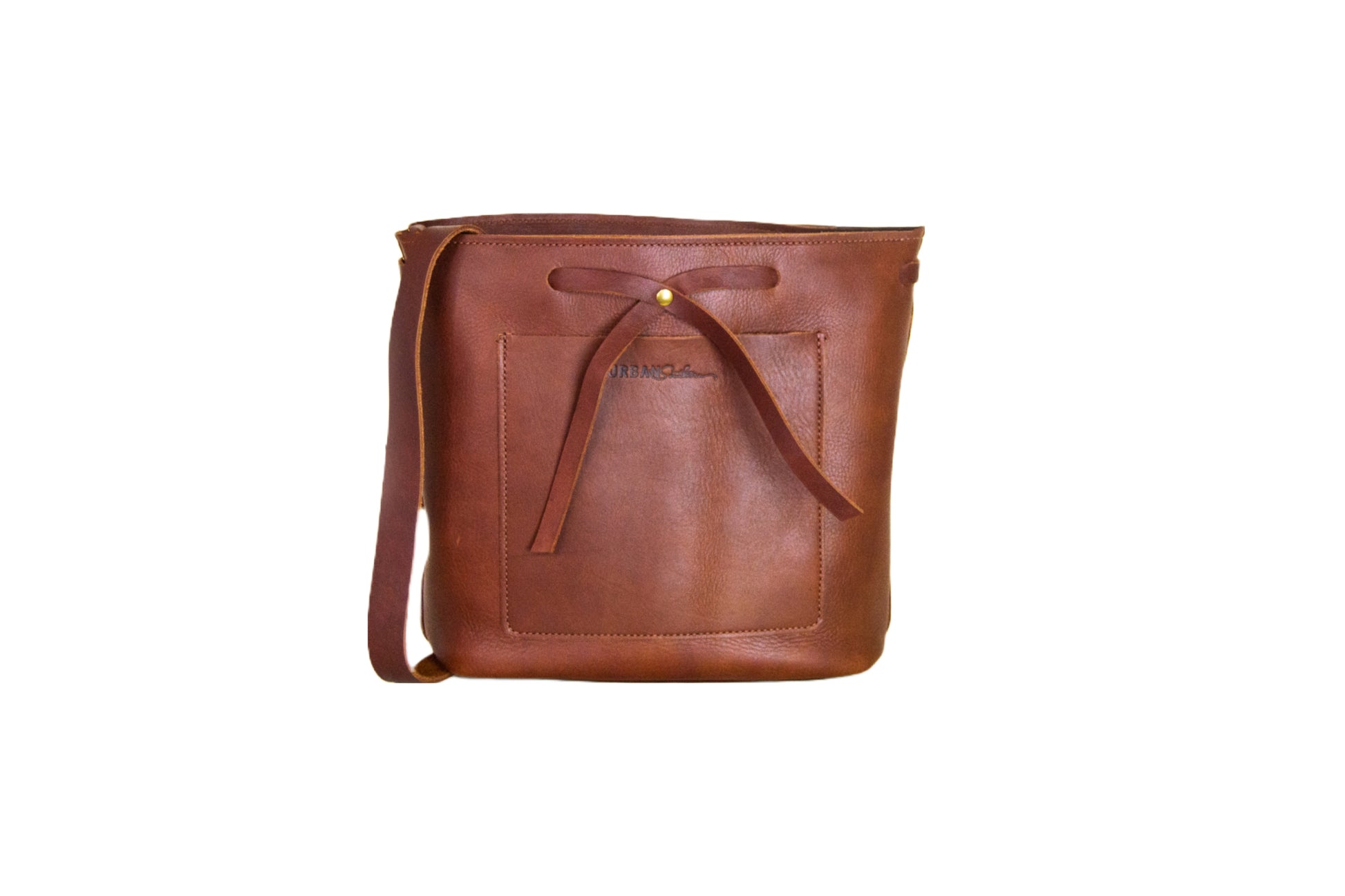 The Lexington Bow handbag, handcrafted from full-grain leather & brass hardware. 