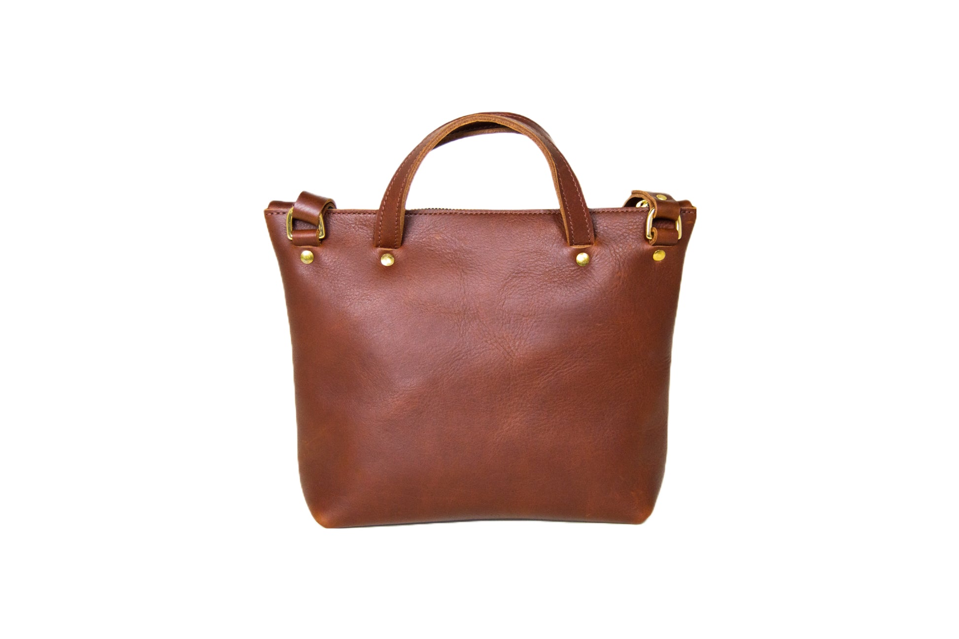 The back view of the Quinn Crossbody, featuring an adjustable strap & convenient grab handles 